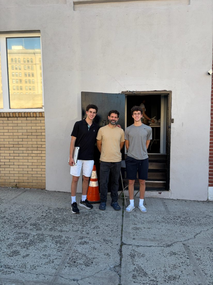 Daniel and Liam with a CSA Kitchen volunteer outside the Mount Vernon site