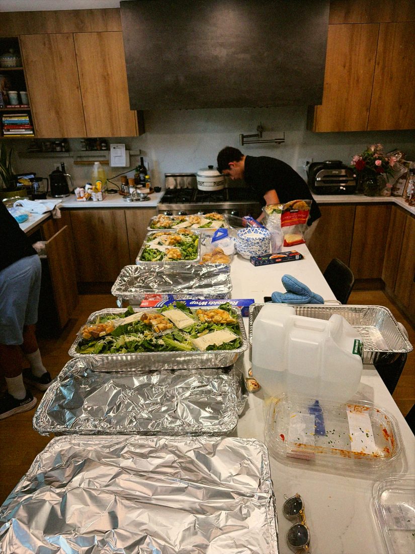 Trays of fresh meals lined up and ready to pack