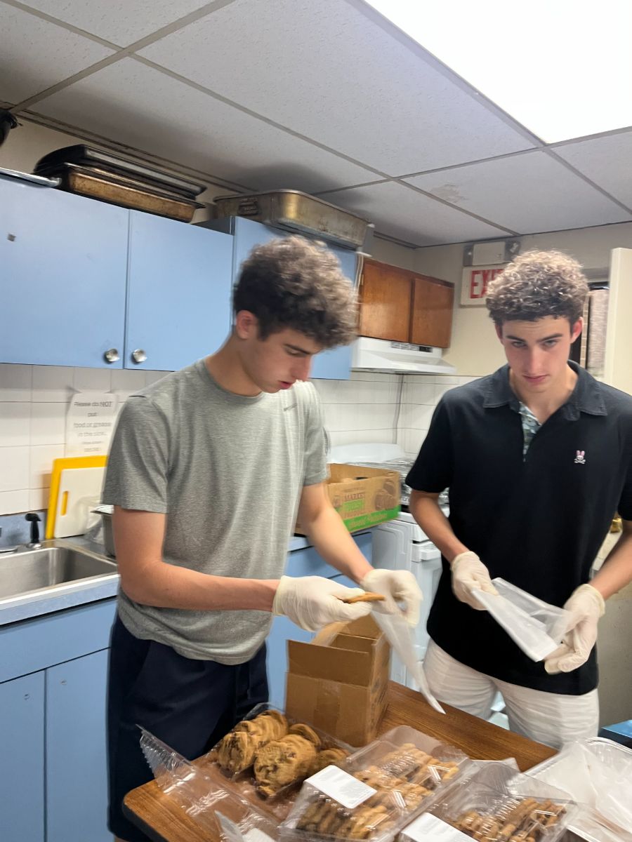 Founders bagging baked goods for delivery